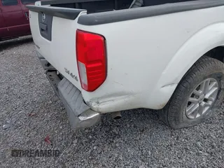 2014 Nissan Frontier SV with VIN 1N6AD0EV2EN718895, listed as a IAAI auction lot 40332972 with 53,391 mi miles and . Bid and sale history available at DreamBid. Image 6.