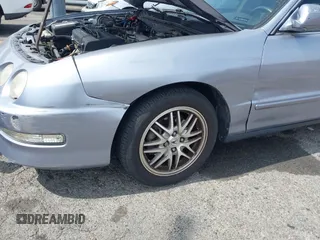 1999 Acura Integra z VIN JH4DB7660XS000593, wystawiony jako IAAI lot #42339059 z przebiegiem 77 805 mil mil oraz . Historia ofert i sprzedaży dostępna na DreamBid. Obrazek 6.