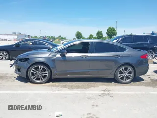 2020 Ford Fusion Titanium with VIN 3FA6P0K96LR173971, listed as a IAAI auction lot 42232469 with 82,474 mi miles and . Bid and sale history available at DreamBid. Image 15.
