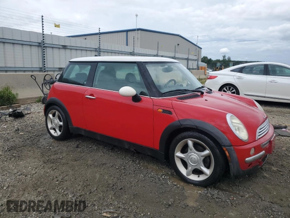 2002 MINI Hardtop with VIN WMWRC33422TE12260, listed as a Copart auction lot 66409484 with 112,119 mi miles and Salvage Title. Bid and sale history available at DreamBid. Image 4.