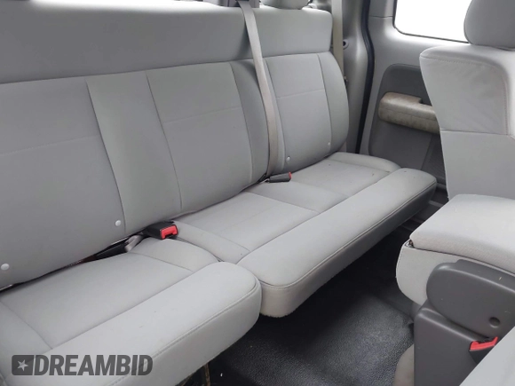 2007 Ford F-150 STX with VIN 1FTRX12W87FA39663, listed as a IAAI auction lot 41965974 with 100,662 mi miles and . Bid and sale history available at DreamBid. Image 8.