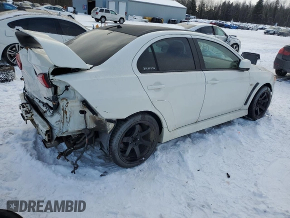 2010 Mitsubishi Lancer Evolution GSR with VIN JA32W8FV4AU604717, listed as a Copart auction lot 83896464 with 140,502 mi miles and Salvage Title. Bid and sale history available at DreamBid. Image 3.