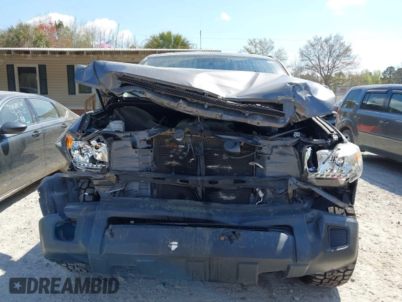 2014 Toyota Tundra 4WD Truck SR with VIN 5TFUM5F11EX055025, listed as a IAAI auction lot 41883017 with 100,565 mi miles. Bid and sale history available at carsss.com. Image 12.
