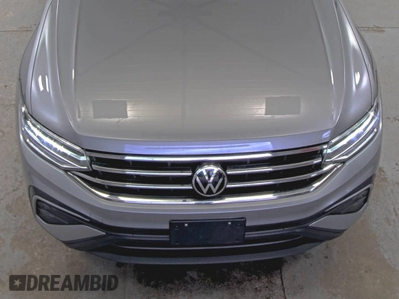 2024 Volkswagen Tiguan SE with VIN 3VV3B7AX9RM084536, listed as a IAAI auction lot 42708274 with 33,250 mi miles and . Bid and sale history available at DreamBid. Image 23.