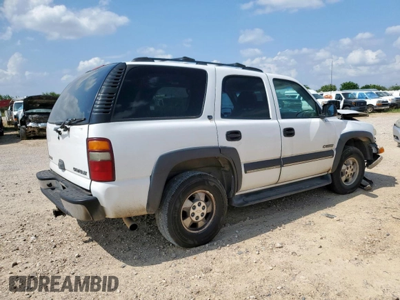 2002 Chevrolet Tahoe LS with VIN 1GNEC13Z32R200857, listed as a Copart auction lot 59812865 with 116,823 mi miles and Salvage title. Bid and sale history available at DreamBid. Image 3.