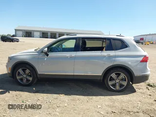 2018 Volkswagen Tiguan SEL Premium with VIN 3VV5B7AX5JM004713, listed as a IAAI auction lot 40498843 with 92,256 mi miles and . Bid and sale history available at DreamBid. Image 14.