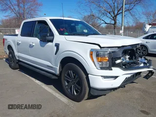 2023 Ford F-150 XL with VIN 1FTFW1ED0PFA18306, listed as a IAAI auction lot 41690965 with 49,988 mi miles. Bid and sale history available at carsss.com. Image 1.