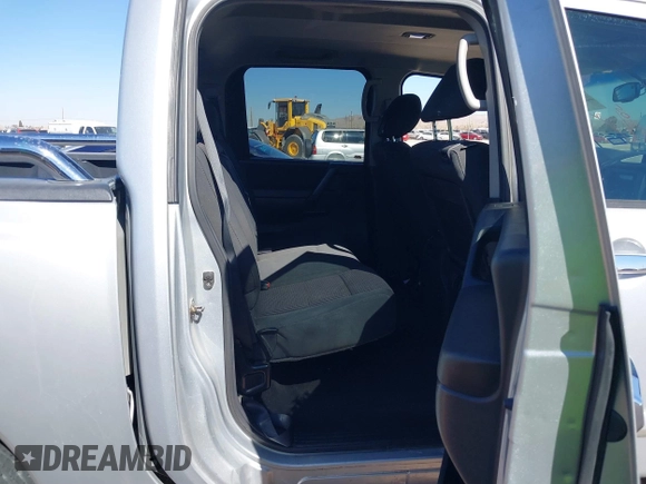 2011 Nissan Titan SV with VIN 1N6BA0ED7BN318878, listed as a IAAI auction lot 41518618 with 169,890 mi miles and . Bid and sale history available at DreamBid. Image 8.