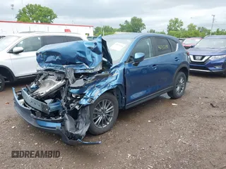 2017 Mazda CX-5 Touring z VIN JM3KFBCL9H0224962, wystawiony jako IAAI lot #42312104 z przebiegiem Nie podano mil oraz . Historia ofert i sprzedaży dostępna na DreamBid. Obrazek 18.