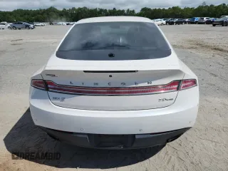 2016 Lincoln MKZ z VIN 3LN6L2G90GR616997, wystawiony jako Copart lot #62917525 z przebiegiem 194 744 mil mil oraz Szkoda całkowita • Salvage title. Historia ofert i sprzedaży dostępna na DreamBid. Obrazek 6.