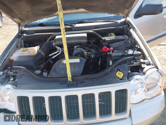 2008 Jeep Grand Cherokee Laredo with VIN 1J8GR48K28C169859, listed as a IAAI auction lot 41965149 with 166,069 mi miles. Bid and sale history available at carsss.com. Image 10.