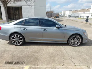 2013 Audi A6 3.0T Prestige with VIN WAUHGAFC4DN126258, listed as a IAAI auction lot 41512291 with 123,298 mi miles. Bid and sale history available at carsss.com. Image 14.
