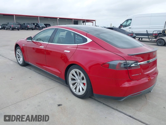 2014 Tesla Model S 60 with VIN 5YJSA1H17EFP30148, listed as a IAAI auction lot 39188024 with Not Provided miles and . Bid and sale history available at DreamBid. Image 3.