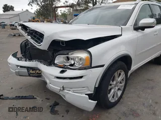 2014 Volvo XC90 with VIN YV4952CY6E1702554, listed as a IAAI auction lot 42073221 with 151,089 mi miles. Bid and sale history available at carsss.com. Image 6.