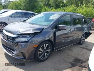 2022 Honda Odyssey Touring with VIN 5FNRL6H89NB008814, listed as a IAAI auction lot 42597738 with 49,933 mi miles and . Bid and sale history available at DreamBid. Image 2.