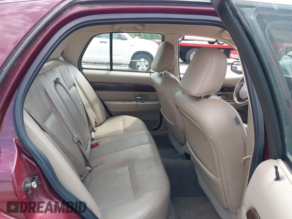 2005 Mercury Grand Marquis LS Premium z VIN 2MEHM75W05X636003, wystawiony jako IAAI lot #42480277 z przebiegiem 224 789 mil mil oraz . Historia ofert i sprzedaży dostępna na DreamBid. Obrazek 8.