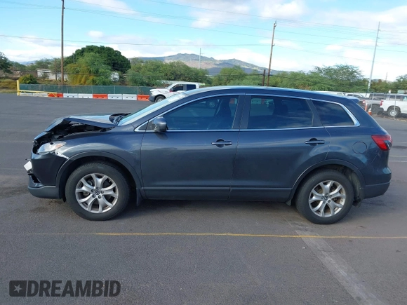 2014 Mazda CX-9 Sport with VIN JM3TB3BAXE0442006, listed as a IAAI auction lot 41430742 with 82,682 mi miles and . Bid and sale history available at DreamBid. Image 14.