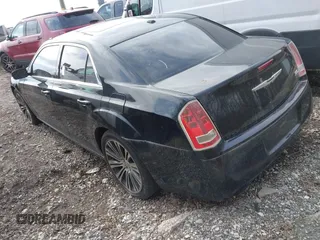 2013 Chrysler 300 with VIN 2C3CCABT4DH709506, listed as a IAAI auction lot 41519992 with 192,617 mi miles. Bid and sale history available at carsss.com. Image 3.