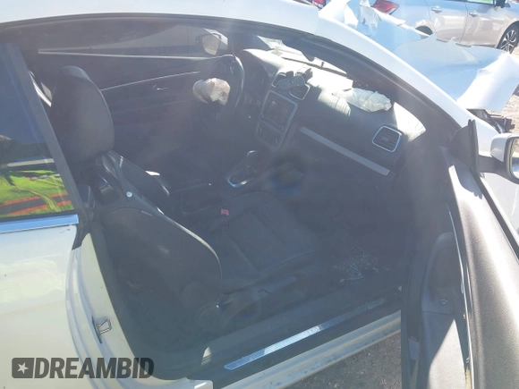 2012 Volkswagen Eos Komfort with VIN WVWBW7AH9CV017620, listed as a IAAI auction lot 40945479 with 96,444 mi miles and . Bid and sale history available at DreamBid. Image 5.