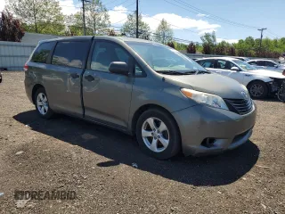 2012 Toyota Sienna with VIN 5TDZK3DC8CS198495, listed as a Copart auction lot 57335205 with 66,786 mi miles and Salvage title. Bid and sale history available at DreamBid. Image 4.