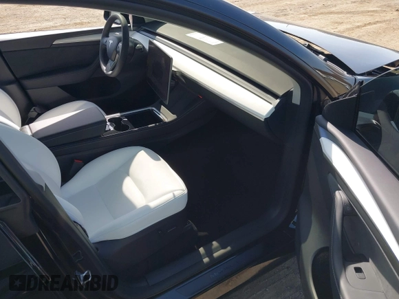 2025 Tesla Model Y Long Range with VIN 7SAYGDEEXSF267888, listed as a IAAI auction lot 41807129 with 3,002 mi miles and . Bid and sale history available at DreamBid. Image 5.