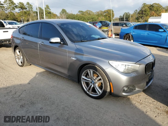 2013 BMW 5 Series with VIN WBASP0C59DC987937, listed as a Copart auction lot 84171054 with 115,522 mi miles and Salvage title. Bid and sale history available at DreamBid. Image 4.