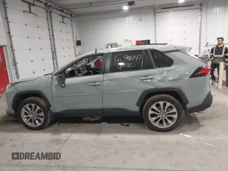 2019 Toyota RAV4 XLE Premium with VIN JTMA1RFV7KD513993, listed as a IAAI auction lot 41774447 with 51,378 mi miles. Bid and sale history available at carsss.com. Image 14.