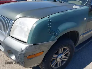 2002 Mercury Mountaineer z VIN 4M2ZU86E22UJ03164, wystawiony jako IAAI lot #42401137 z przebiegiem Nie podano mil oraz . Historia ofert i sprzedaży dostępna na DreamBid. Obrazek 6.