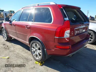 2013 Volvo XC90 Premier Plus z VIN YV4952CZ9D1652367, wystawiony jako IAAI lot #41331305 z przebiegiem 108 519 mil mil oraz . Historia ofert i sprzedaży dostępna na DreamBid. Obrazek 3.