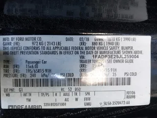 2018 Ford Focus S with VIN 1FADP3E29JL259004, listed as a IAAI auction lot 41841485 with 77,567 mi miles. Bid and sale history available at carsss.com. Image 9.