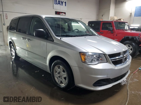 2012 Dodge Grand Caravan SE with VIN 2C4RDGBG5CR312016, listed as a Copart auction lot 52887255 with 96,355 mi miles and Salvage Title. Bid and sale history available at DreamBid. Image 4.