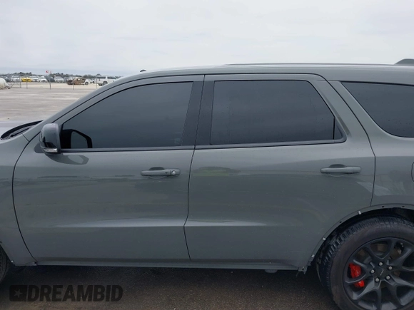 2021 Dodge Durango SRT Hellcat with VIN 1C4SDJH92MC605759, listed as a IAAI auction lot 41639174 with 4,800 mi miles and . Bid and sale history available at DreamBid. Image 15.