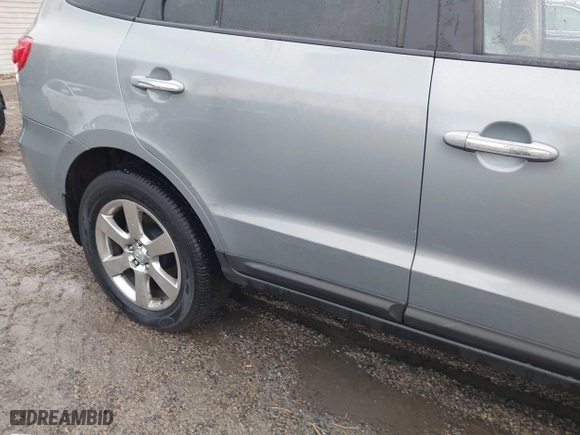 2009 Hyundai Santa Fe SE with VIN 5NMSH13E49H296636, listed as a IAAI auction lot 41464222 with 191,583 mi miles. Bid and sale history available at carsss.com. Image 18.