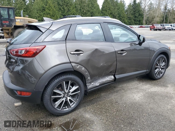 2017 Mazda CX-3 Touring with VIN JM1DKFC79H0148103, listed as a Copart auction lot 51343025 with 79,765 mi miles and Salvage Title. Bid and sale history available at DreamBid. Image 3.