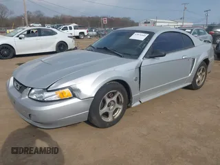 2004 Ford Mustang Standard with VIN 1FAFP40604F211340, listed as a IAAI auction lot 42071445 with Not provided miles and . Bid and sale history available at DreamBid. Image 2.