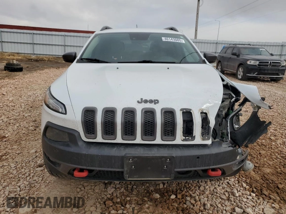 2014 Jeep Cherokee Trailhawk with VIN 1C4PJMBS7EW183855, listed as a Copart auction lot 46143085 with 146,901 mi miles and Salvage Title. Bid and sale history available at DreamBid. Image 5.