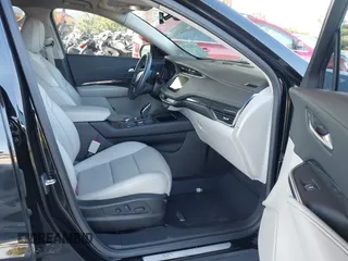 2020 Cadillac XT4 FWD Premium Luxury with VIN 1GYFZCR42LF144359, listed as a IAAI auction lot 42012677 with 34,490 mi miles and . Bid and sale history available at carsss.com. Image 5.