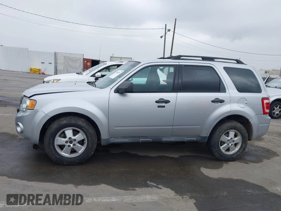 2012 Ford Escape XLT with VIN 1FMCU9D74CKB79211, listed as a IAAI auction lot 42464491 with 144,757 mi miles and . Bid and sale history available at DreamBid. Image 14.