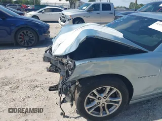 2015 Chevrolet Camaro LS z VIN 2G1FB1E30F9286632, wystawiony jako IAAI lot #41933048 z przebiegiem 164 493 mil mil oraz . Historia ofert i sprzedaży dostępna na DreamBid. Obrazek 19.