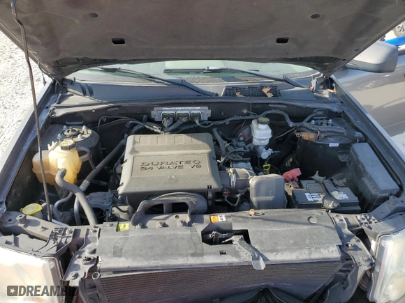 2010 Ford Escape XLT with VIN 1FMCU0DG6AKD05058, listed as a Copart auction lot 50449035 with 127,781 mi miles and Salvage Title. Bid and sale history available at carsss.com. Image 14.