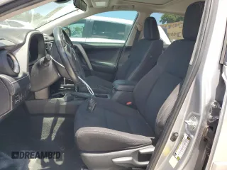 2018 Toyota RAV4 XLE with VIN 2T3WFREV7JW423768, listed as a Copart auction lot 61841875 with 111,991 mi miles and Salvage title. Bid and sale history available at DreamBid. Image 7.