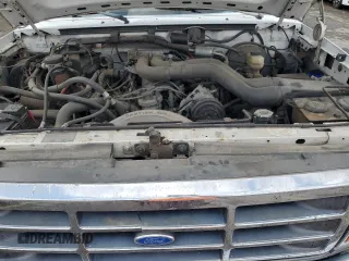1992 Ford F-250 z VIN 1FTHX26G4NKB83915, wystawiony jako Copart lot #55854535 z przebiegiem Nie podano mil oraz Szkoda całkowita • Salvage title. Historia ofert i sprzedaży dostępna na DreamBid. Obrazek 11.