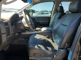 2005 Nissan Titan LE with VIN 1N6BA07B95N571880, listed as a Copart auction lot 57527435 with 199,577 mi miles and Salvage title. Bid and sale history available at DreamBid. Image 7.
