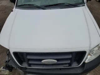 2005 Ford F-150 XL with VIN 1FTRF12W65NB56941, listed as a Copart auction lot 52200065 with 164,464 mi miles and Salvage title. Bid and sale history available at DreamBid. Image 11.
