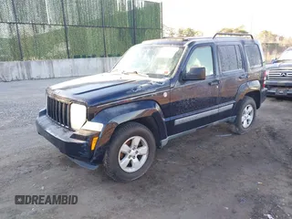 2011 Jeep Liberty Sport with VIN 1J4PN2GK2BW571471, listed as a IAAI auction lot 41199106 with 144,037 mi miles and . Bid and sale history available at DreamBid. Image 2.