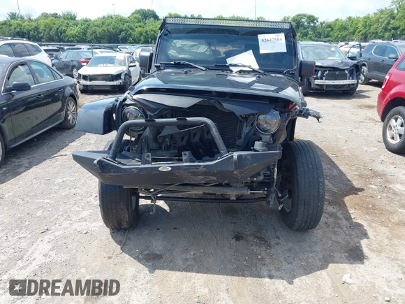 2008 Jeep Wrangler Unlimited Sahara with VIN 1J4GA59128L608515, listed as a IAAI auction lot 42627584 with 157,821 mi miles and . Bid and sale history available at DreamBid. Image 6.