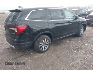 2019 Honda Pilot EX-L with VIN 5FNYF6H55KB071767, listed as a IAAI auction lot 41941696 with 66,844 mi miles and . Bid and sale history available at carsss.com. Image 4.