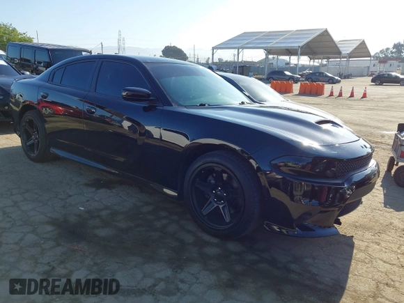 2020 Dodge Charger R/T z VIN 2C3CDXCT4LH131260, wystawiony jako IAAI lot #42185512 z przebiegiem 65 197 mil mil oraz . Historia ofert i sprzedaży dostępna na DreamBid. Obrazek 1.