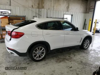 2015 BMW X6 sDrive35i with VIN 5UXKU0C50F0F91865, listed as a Copart auction lot 82128374 with 122,395 mi miles and Salvage Title. Bid and sale history available at carsss.com. Image 3.