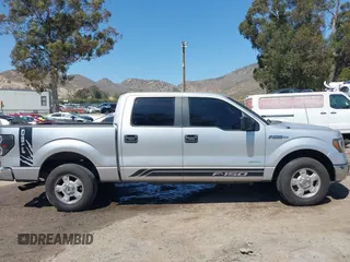 2014 Ford F-150 XL with VIN 1FTFW1CT3EKD12216, listed as a IAAI auction lot 42110775 with 140,673 mi miles. Bid and sale history available at carsss.com. Image 13.